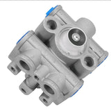 Direct bottom view of the k070951 valve housing displaying the main supply port, multiple delivery ports, and central air exhaust.