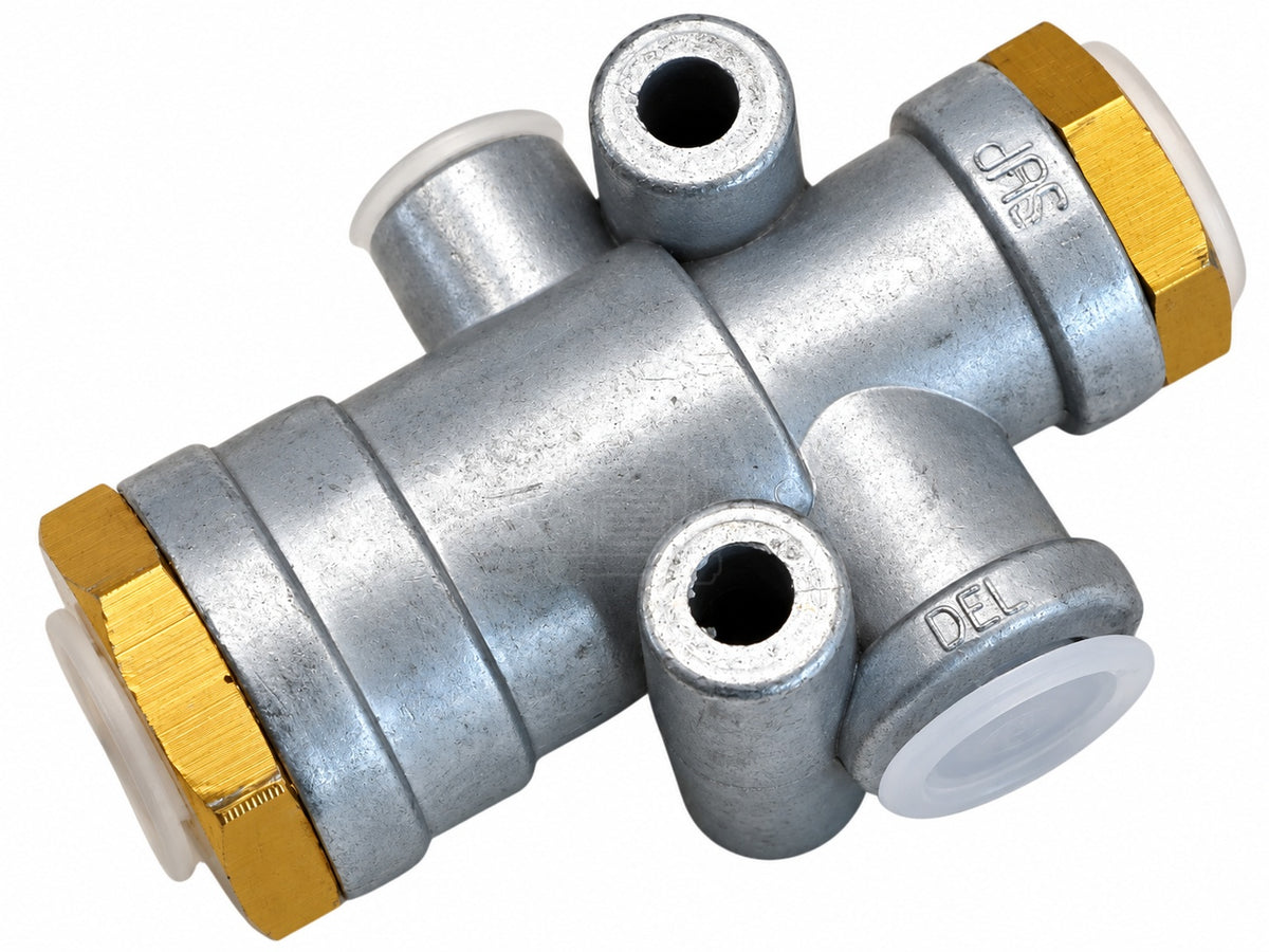 Top-angled view of an SV-1 type synchronizing valve for air brake systems, item code K028994, showing port markings SUP and DEL with plastic shipping plugs.