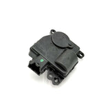 Genuine PACCAR T6892003 HVAC mode door actuator, top down view showing the electrical connector and mounting holes.