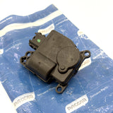 PACCAR T6892003 HVAC blend door actuator unboxed and placed on top of its branded original packaging.