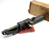 Angled view of the 8M0063382 unit showcasing the main hydraulic valve block body.
