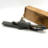 Reverse side layout of the 8M0063382 steering cylinder assembly resting before the box.