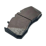 Detailed view of a single brake pad focusing on the friction material surface and a central wear slot code 23649812.