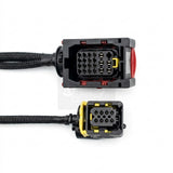 Close-up view of the heavy-duty multi-pin connectors on the 88890284 breakout harness. Shows the detailed pin configuration and secure yellow and red locking latches for part 88890284.