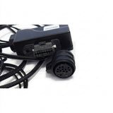 Detailed view of the 16-pin circular transmission diagnostic adapter plug next to the main interface box. Genuine truck repair tool, part number 88890284.