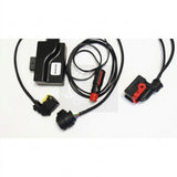 Component overview of the 88890284 Gearbox Interface Harness kit. Clearly shows the 12V auxiliary power plug, circular connector, and the module labeled with part number 88890284.