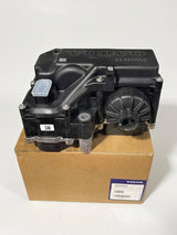 • Top-down view of the black OEM Volvo DEF pump (part number 85031447), placed on its original cardboard packaging box.