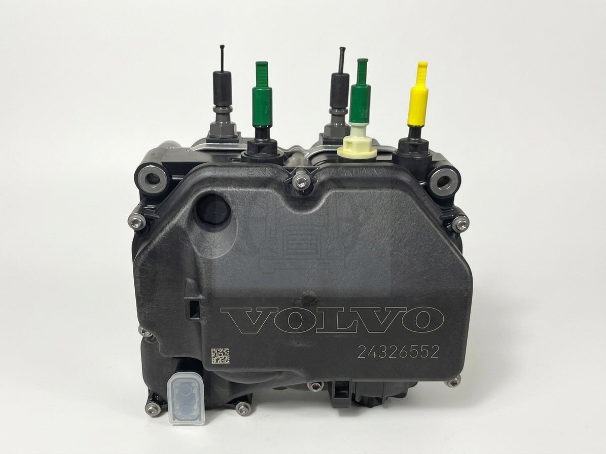 • Clear front-facing shot of the Volvo 85031447 dosing module against a plain white background, highlighting the distinct colored connectors.