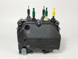 • Clear front-facing shot of the Volvo 85031447 dosing module against a plain white background, highlighting the distinct colored connectors.