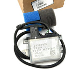 Close-up view of the metallic control module for a Volvo/Mack exhaust sensor, clearly displaying manufacturing stamps and serial data, interchanging with original part number 23320447.