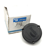 Front face of the round Bendix BlindSpotter radar sensor module next to its retail box, clearly displaying the embossed Bendix and BlindSpotter logos. Code: 85112391.