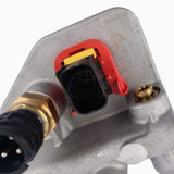 Close-up view of the 21534115 Hydrocarbon Injector Module, detailing the electrical terminal connections and internal casting marks.