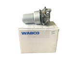 Rear angle of the WABCO air dryer system (24432421) displaying the back ports and pressure valves with the box below.